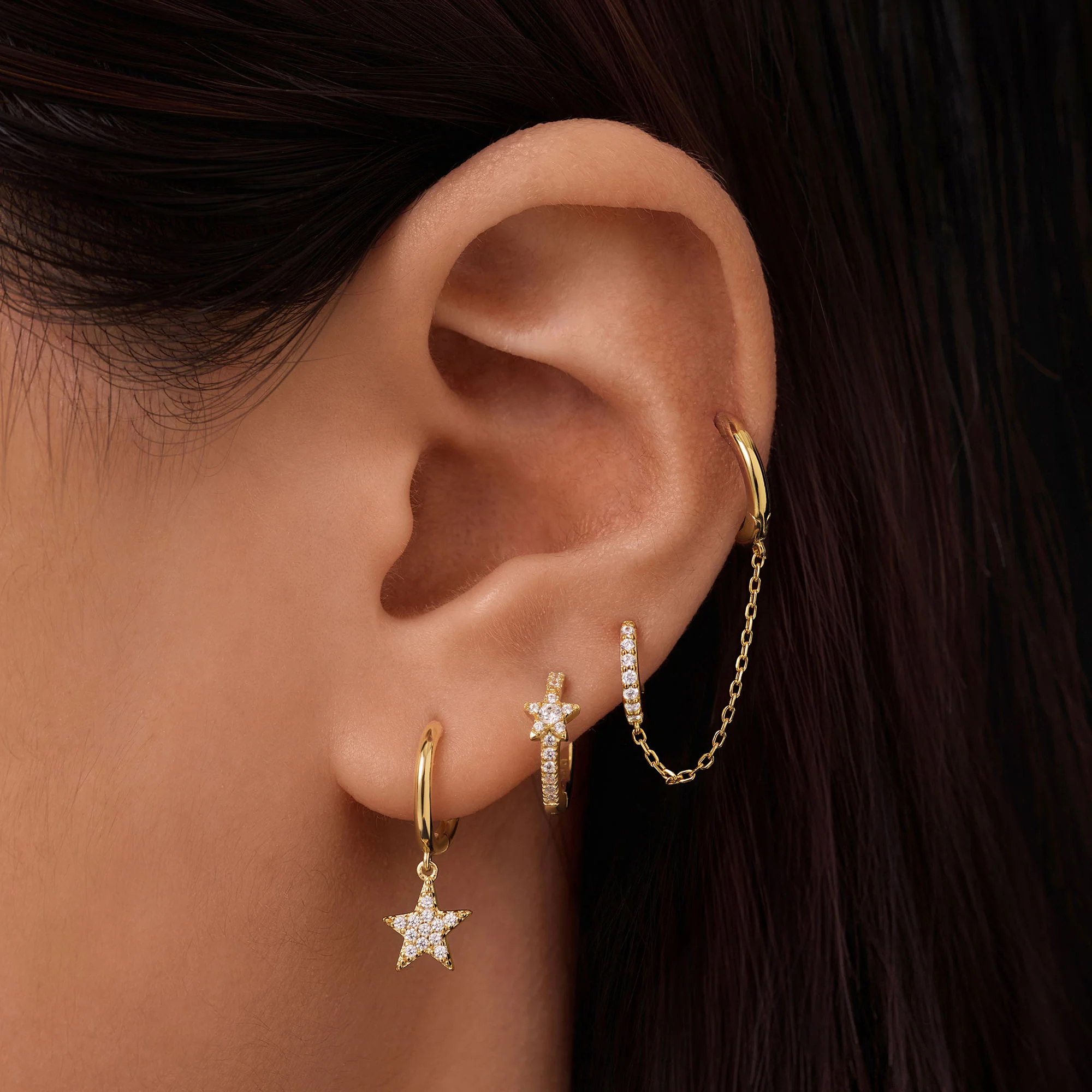 Asymmetrical Star CZ Huggies - Image 2